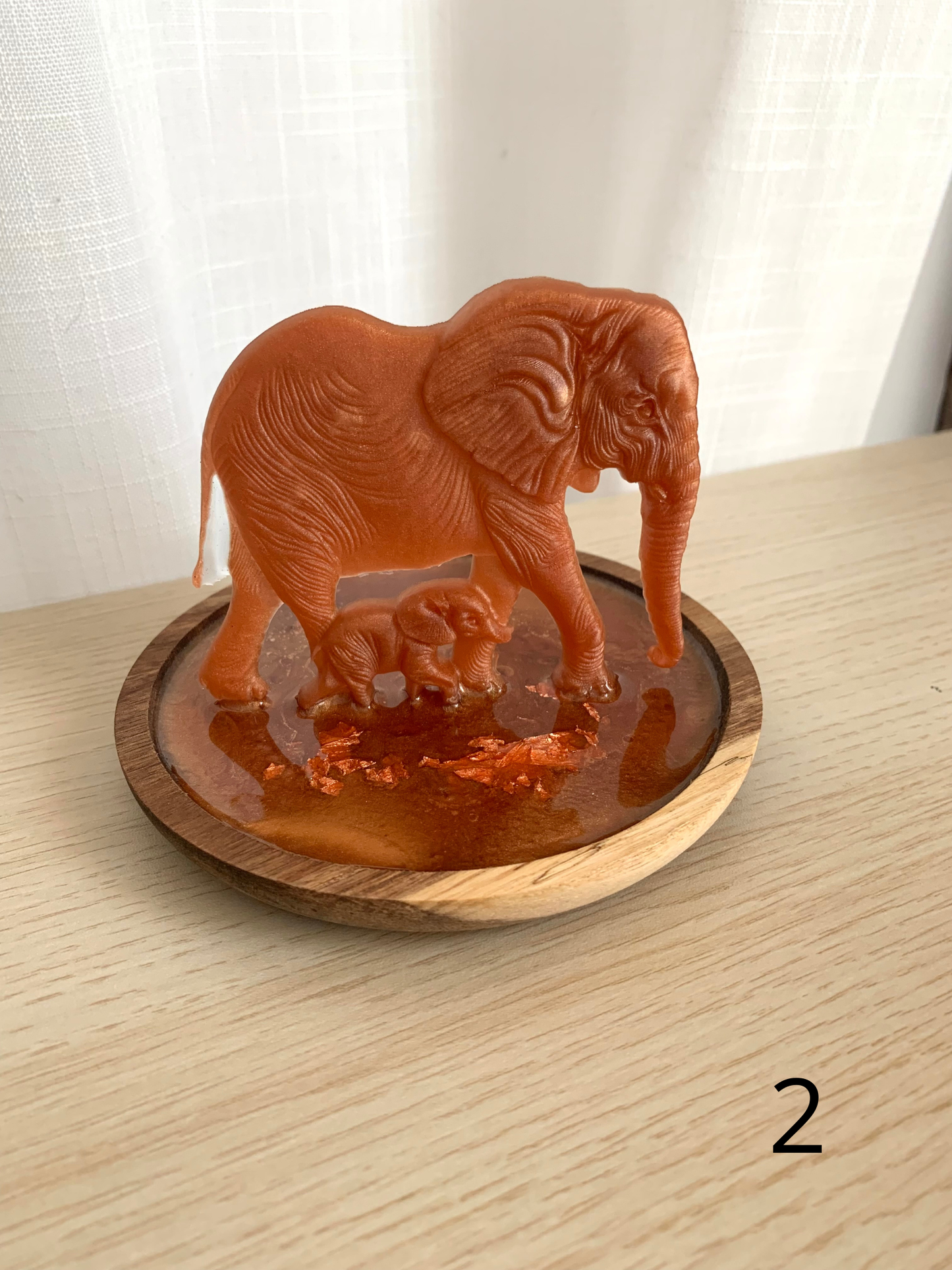 Eléphants sur socle bois