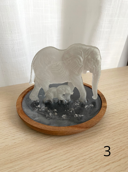 Eléphants sur socle bois