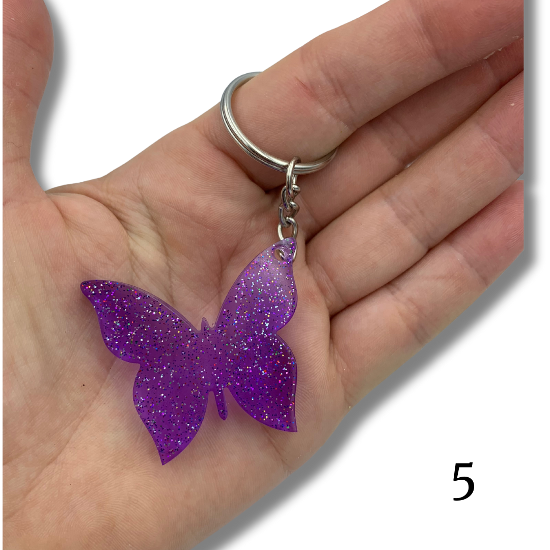 Porte clés femme rubans papillon cabochon violet - Un grand marché